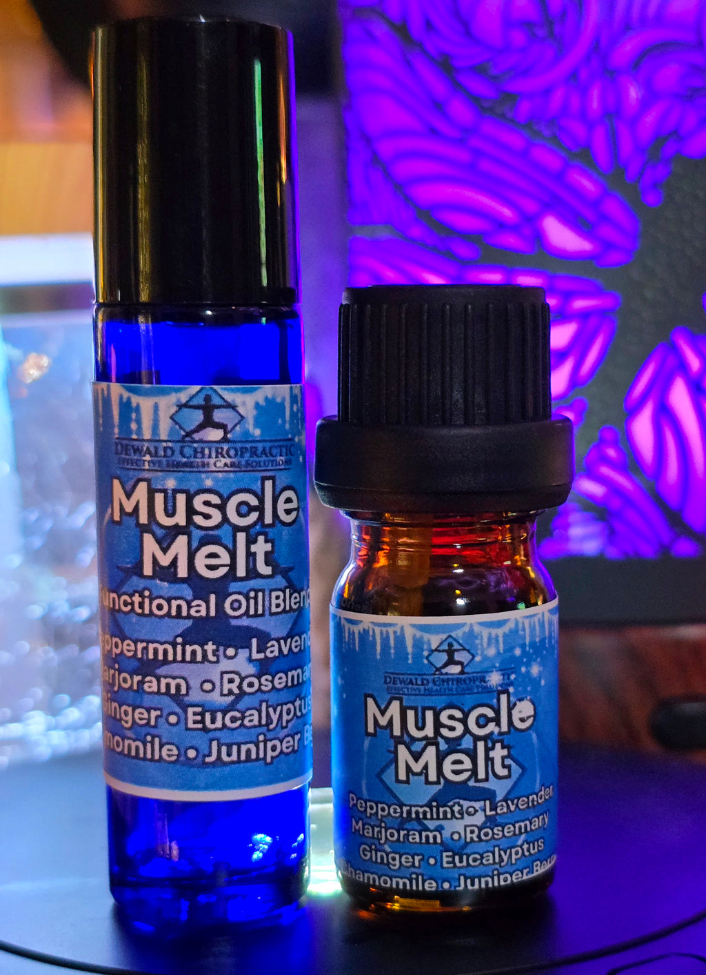Muscle Melt functional oil blend 5ml bottle and roller Dewald Chiropractic Spa