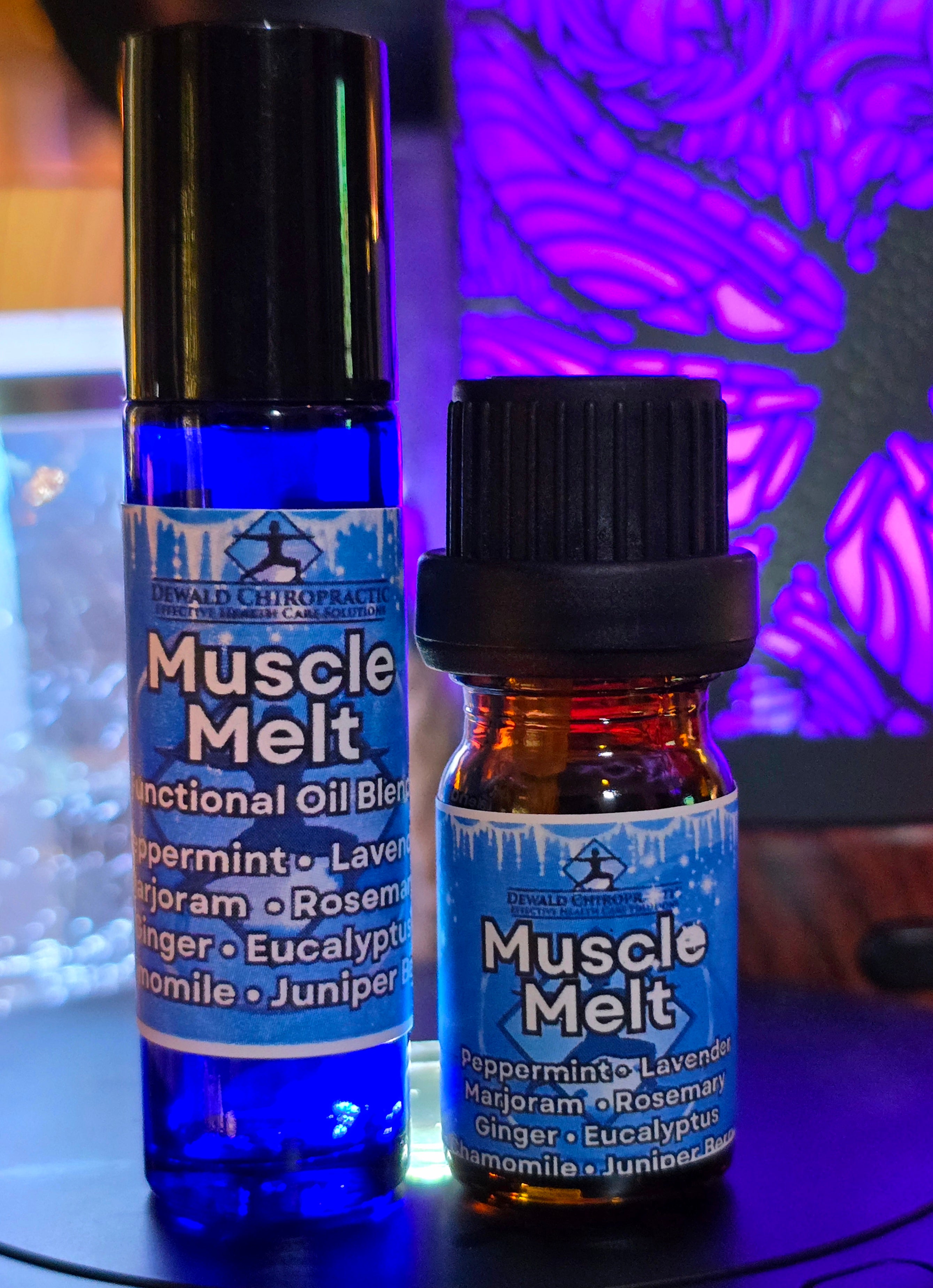 Muscle Melt functional oil blend 5ml bottle and roller Dewald Chiropractic Spa
