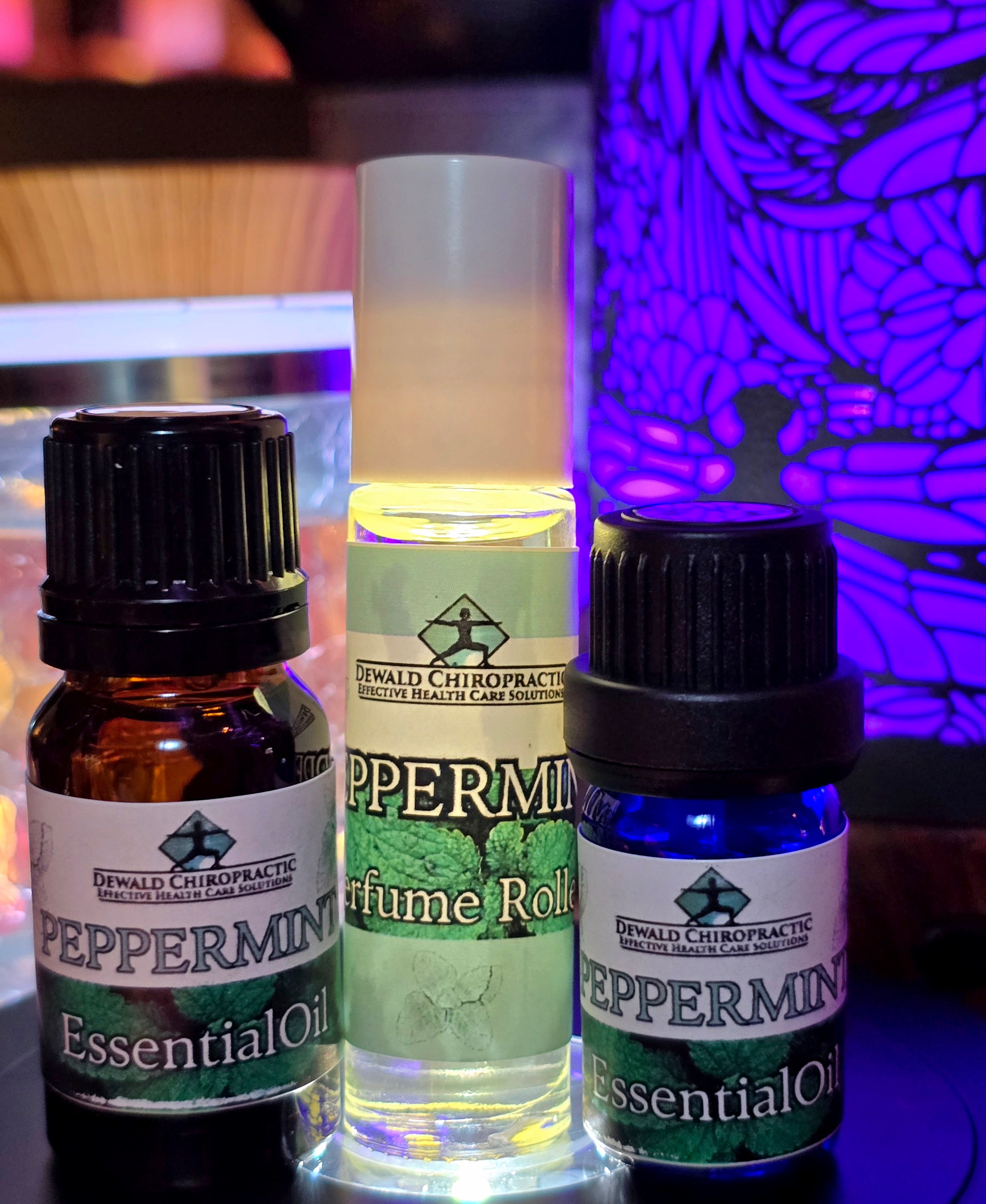Peppermint essential oil 5ml 10ml bottles and perfume roller Dewald Chiropractic Spa